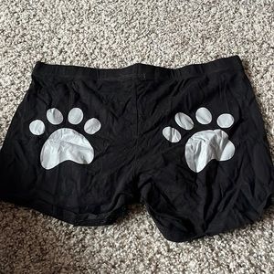 Black shorts with paws on the butt